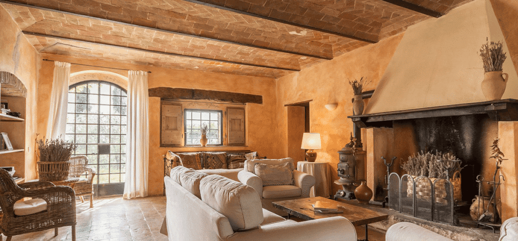 Tuscan countryside aesthetic showcasing Italian Villa interior design style with time-worn textures and rustic grandeur