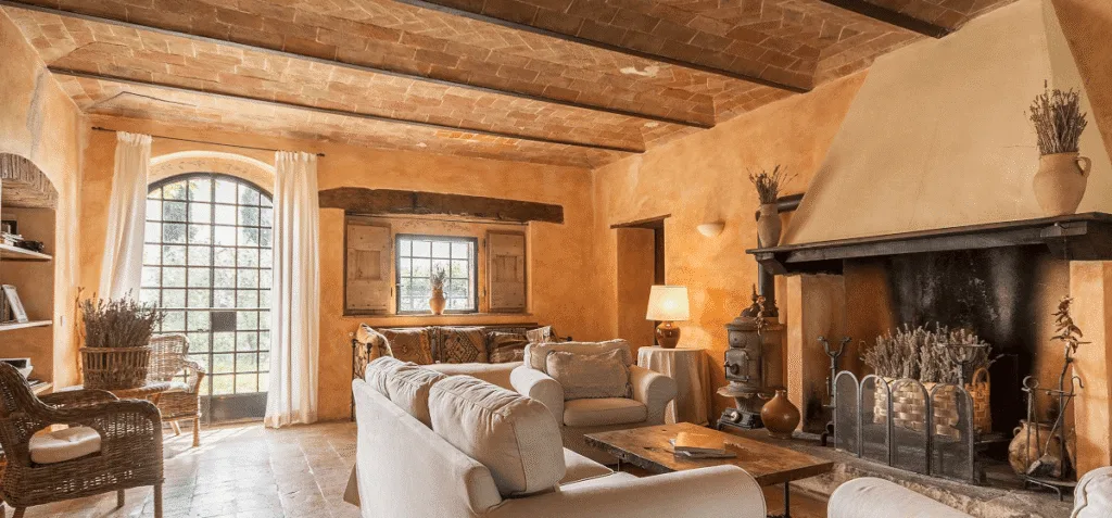 Tuscan countryside aesthetic showcasing Italian Villa interior design style with time-worn textures and rustic grandeur